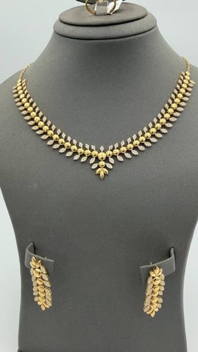 طقم ذهب عيار 18