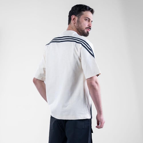 تيشيرت اوفر سايز بكتابه امامية DISTEND رياضى - اسو...