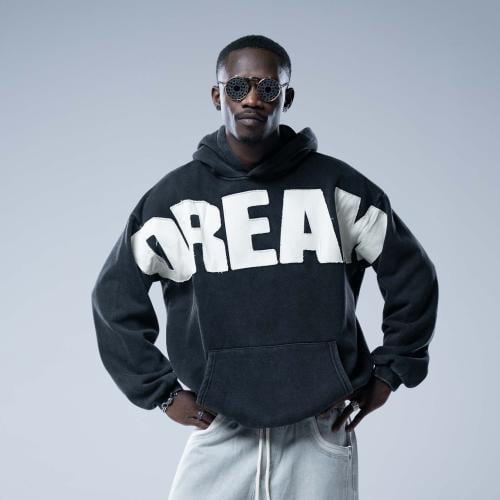 هودي أوفرسايز بقبعة وتطريز حروف كبيرة وستايل مغسول...