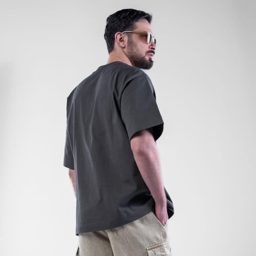 تيشيرت مزين بشعار SWAG باللون الاصفر - زيتي