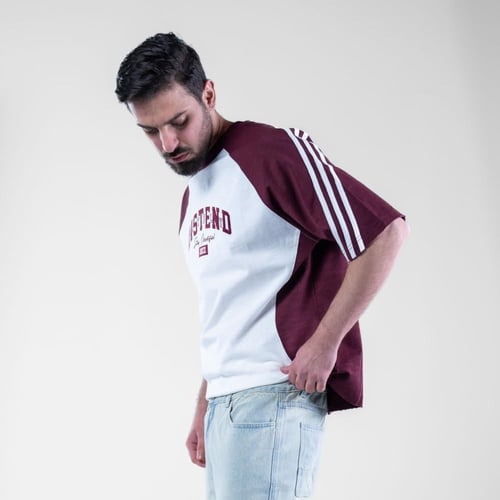 تيشيرت اوفر سايز بكتابه امامية DISTEND رياضى - ابي...