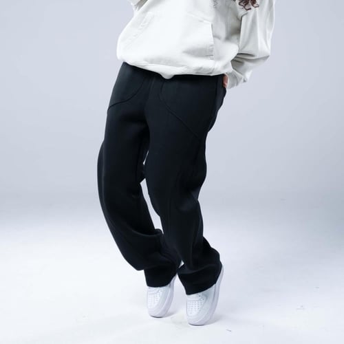 بنطلون واسع أوفرسايز بخصر مطاطي وجيوب أمامية كبيرة...