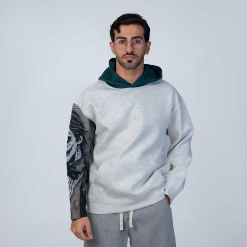 هودي سادة مع كاب زيتي اوفر سايز تطريز الكم الايمن...