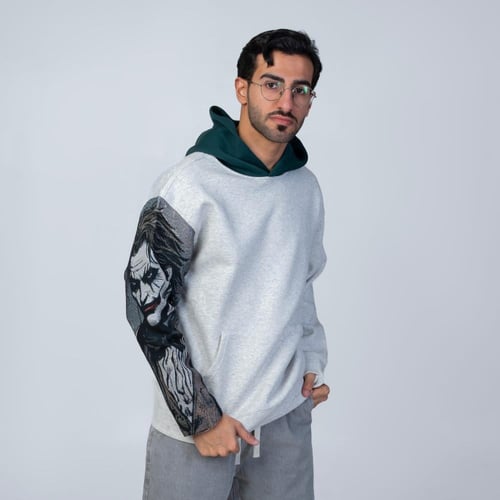 هودي سادة مع كاب زيتي اوفر سايز تطريز الكم الايمن...