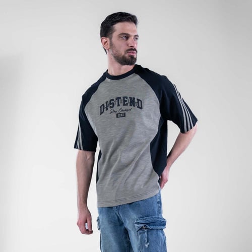 تيشيرت اوفر سايز بكتابه امامية DISTEND رياضى - زيت...