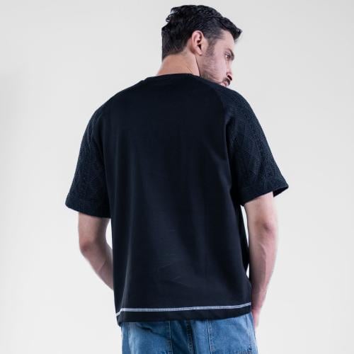 تيشيرت اوفرسايز خامه طبية منقوشة بتصميم شبكي هندسي...