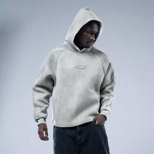 هودي أوفرسايز بقصة ريجلان وشعار مطرز وتأثير مغسول...