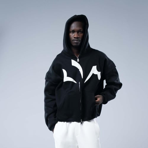 هودي واسع بكاب وطباعة بيضاء حادة - اسود