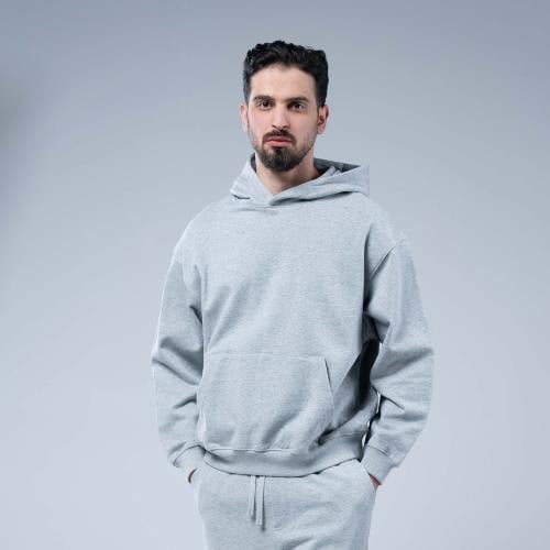 هودي سادة أوفرسايز بقبعة وجيب كانغارو واسع وحافة م...