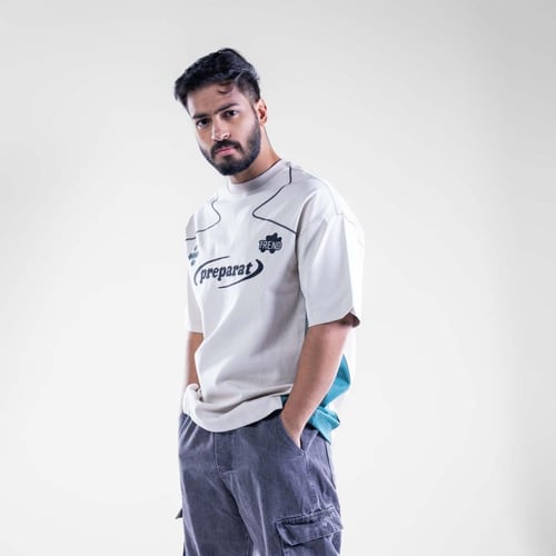 تيشيرت اوفر سايز نص كم بكتابة اماميه وخطوط منحنيه...