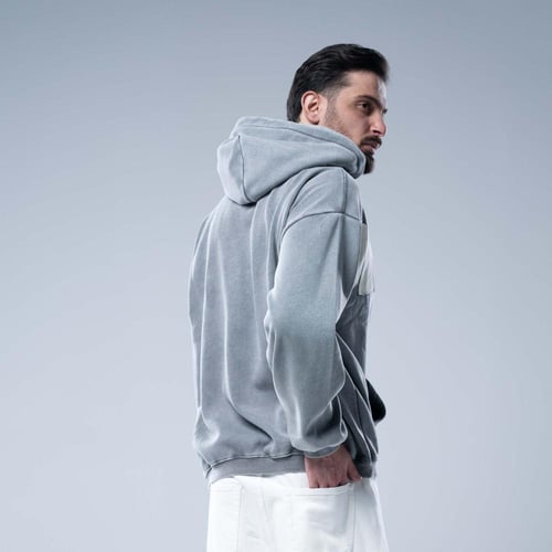 هودي أوفرسايز بقبعة وتطريز حروف كبيرة وستايل مغسول...