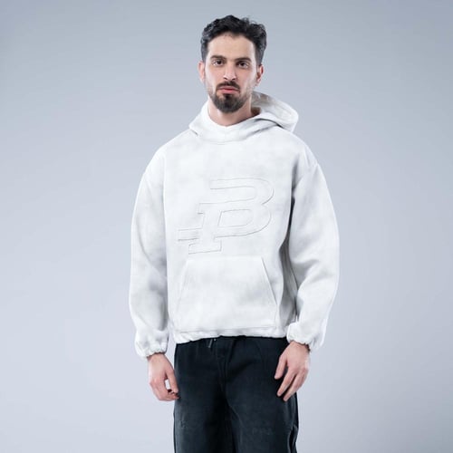 هودي أوفرسايز بشعار مطبوع ببروز وجيب كانغارو وحافة...