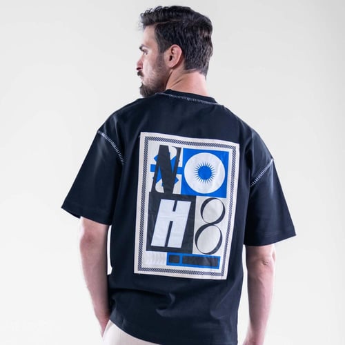 تيشيرت اوفرسايز خامه طبية بطبعة خلفية كبيرة - اسود