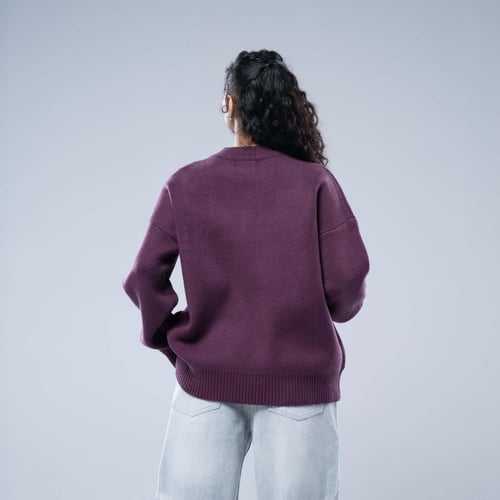 سويتر شتوي أوفرسايز بياقة مستديرة وتصميم حروف بارز...