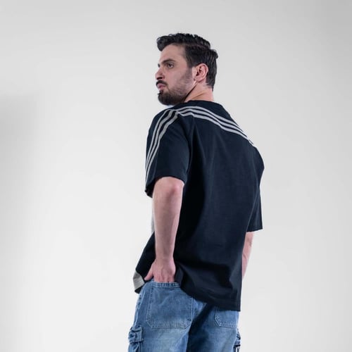 تيشيرت اوفر سايز بكتابه امامية DISTEND رياضى - زيت...