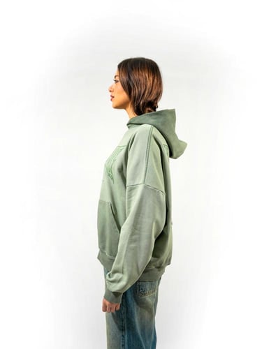 هودي بطبعه أمامية وتطريز خلفي مميز - تركواز فاتح