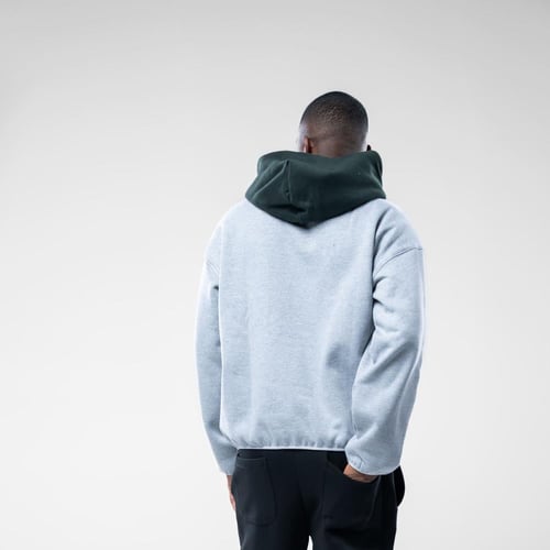 هودي أوفرسايز بقبعة متباينة وطباعة نص على الصدر وح...