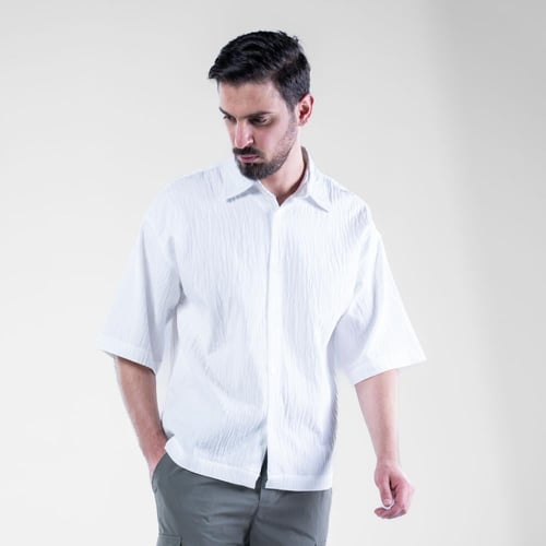 قميص اوفرسايز بوليستر باكمام قصيرة مميز وراقى - اب...