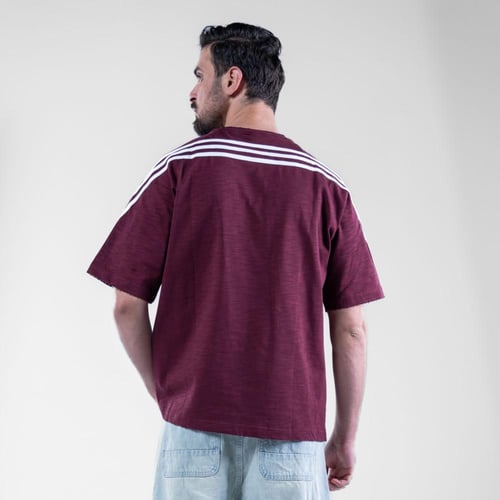 تيشيرت اوفر سايز بكتابه امامية DISTEND رياضى - ابي...