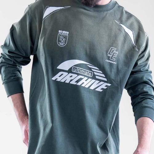 تيشيرت كم طويل مغسول بطبعه مميزه - اخضر