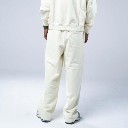 بنطلون واسع أوفرسايز بخصر مطاطي وقصة عريضة - كريمي...