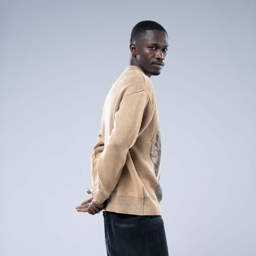 سويتر اوفرسايز بطباعة ظل كبيرة مميزة - بيج فاتح