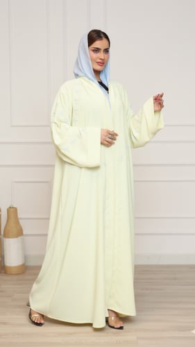 عباية كريب نواعم اصفر | بتطريز هندسي أزرق