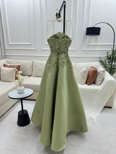 فستان سهره اللون زيتي ميكادو روسي + كلفه راقيه 371