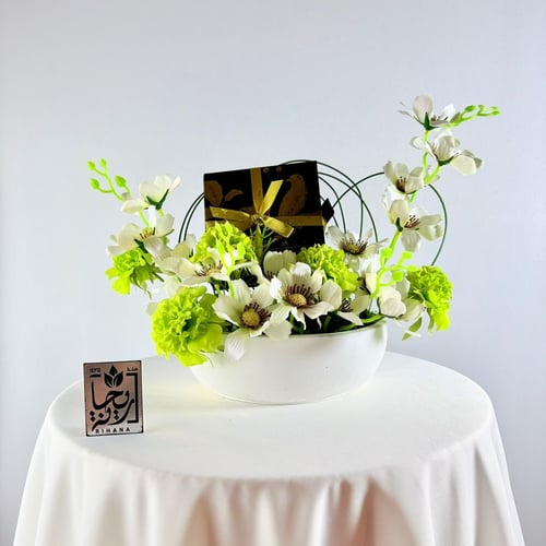 Chocolate and flowers arrangement