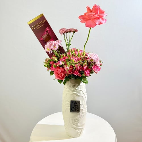 Vase of whispers of the roses