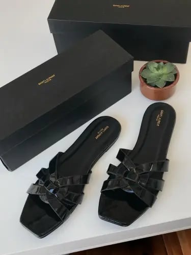 Yves Saint Laurent women's slippers with braided design – shiny black leather