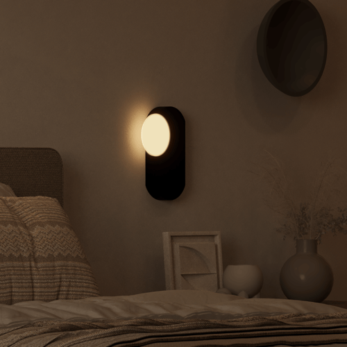 إضاءة جدارية بالبطارية شكل بيضاوي اسود