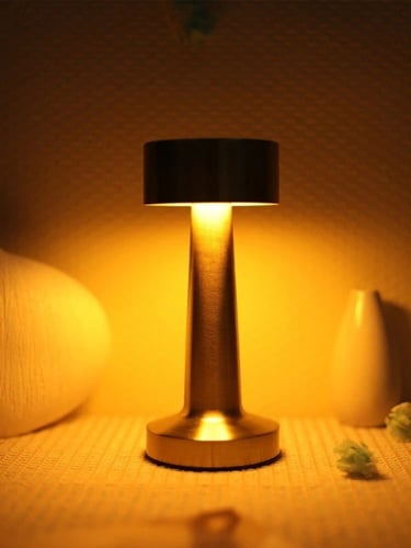 ابجورة شحن لاسلكي باللون الذهبي