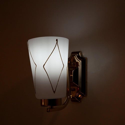 اضاءة حائط ذهبية مع زجاج مثلج