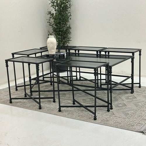 طقم طاولات 7قطع سطح زجاج شفاف قاعده حديد لون اسود