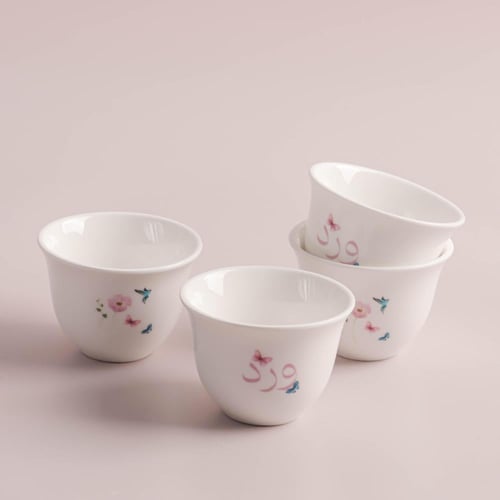 فنجال قهوة في علبة مغلقة مع ثيم