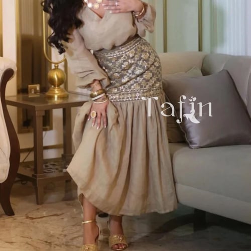 فستان سهرة طويل بأكمام طويلة