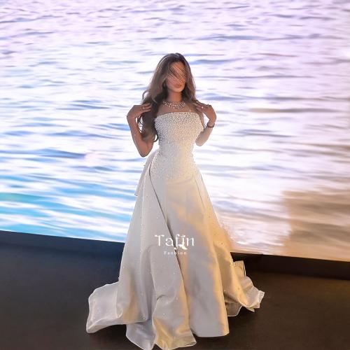 فستـان ملَـك الحصـري