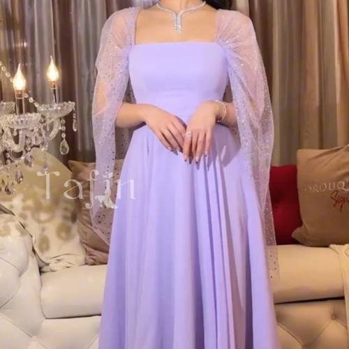 فستان سهرة طويل واسع من الاسفل