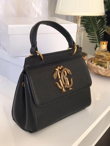 شنطة روبرتو كافالي