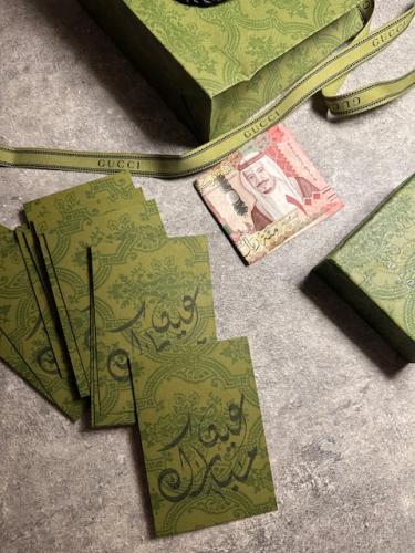 12ظرف فلوس Gucci