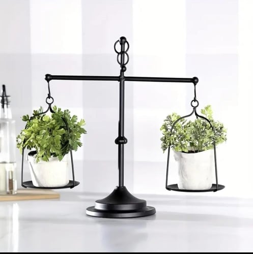 حامل بشكل ميزان