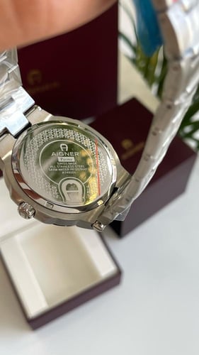 ساعه اقنر فضي من داخل اسود شامل الملحقات