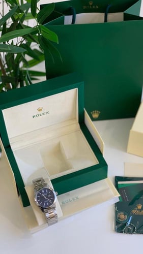 ساعه رولكس فضي مع ازرق شامل الملحقات