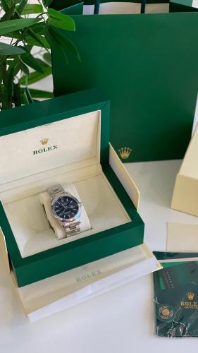 ساعه رولكس فضي مع ازرق شامل الملحقات