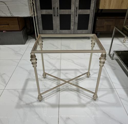 طاوله زاويه دور واحد لون شمباني