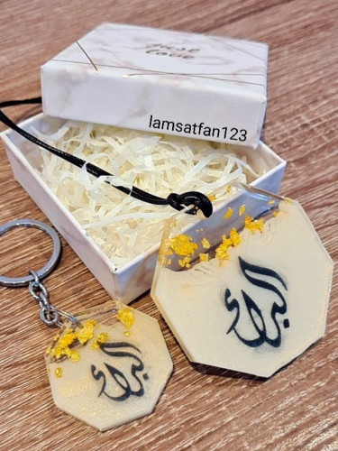 تعليقة سيارة وميدالية مفاتيح