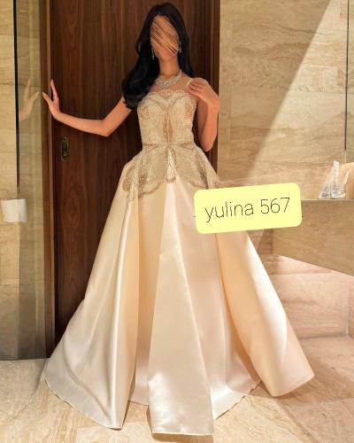 فستان سهرة بيج بتصميم فراشة خرزية براقة