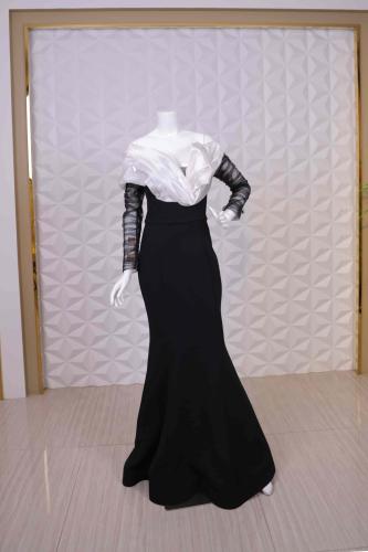 فستان سهرة أسود راقٍ بلمسة ساتان وأكمام شفافة