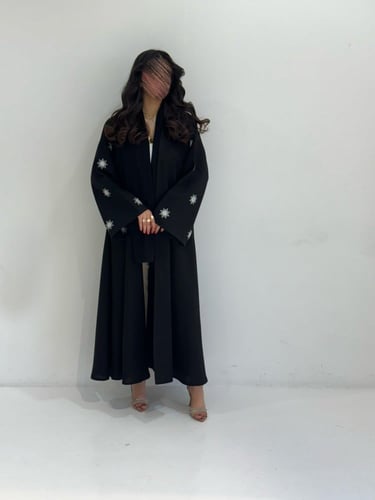 كتان مطرز شمس أبيض